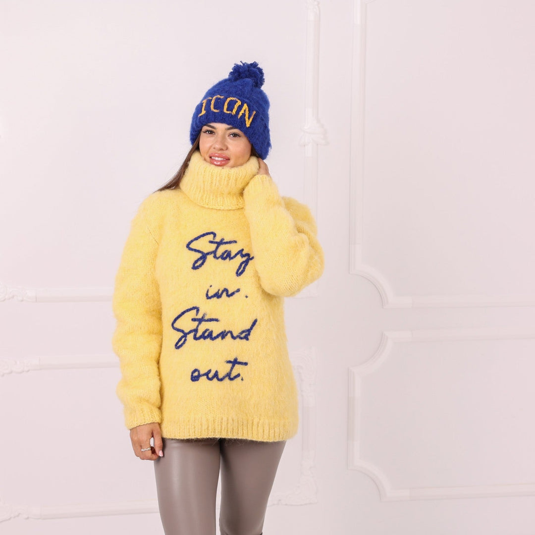Oversized yellow alpaca sweater with custom blue embroidery