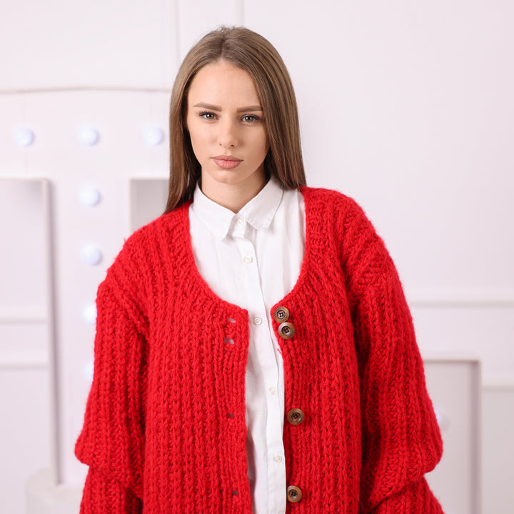 Warm red wool alpaca cardigan texture