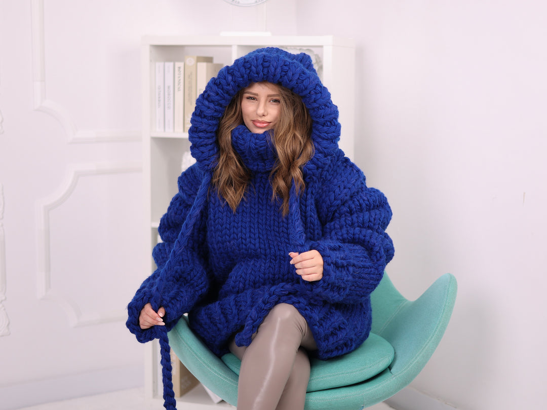 Blue extra chunky wool alpaca hooded sweater T2384 front seated view