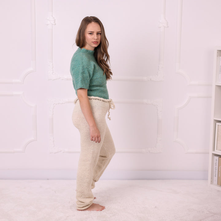 T2394 cream 100% raw wool hand knitted pants side full view