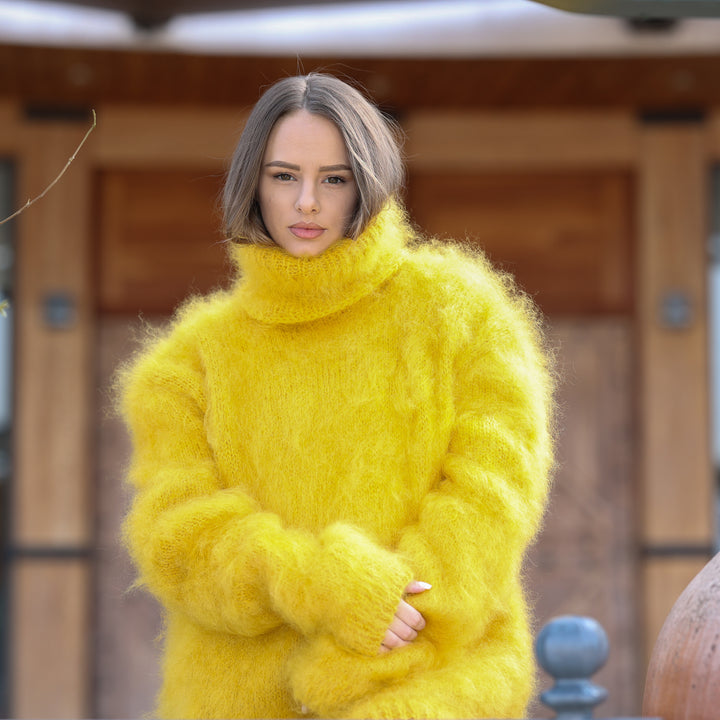 Bright yellow fluffy Kid Mohair oversized turtleneck sweater T2413 front portrait with crossed arms