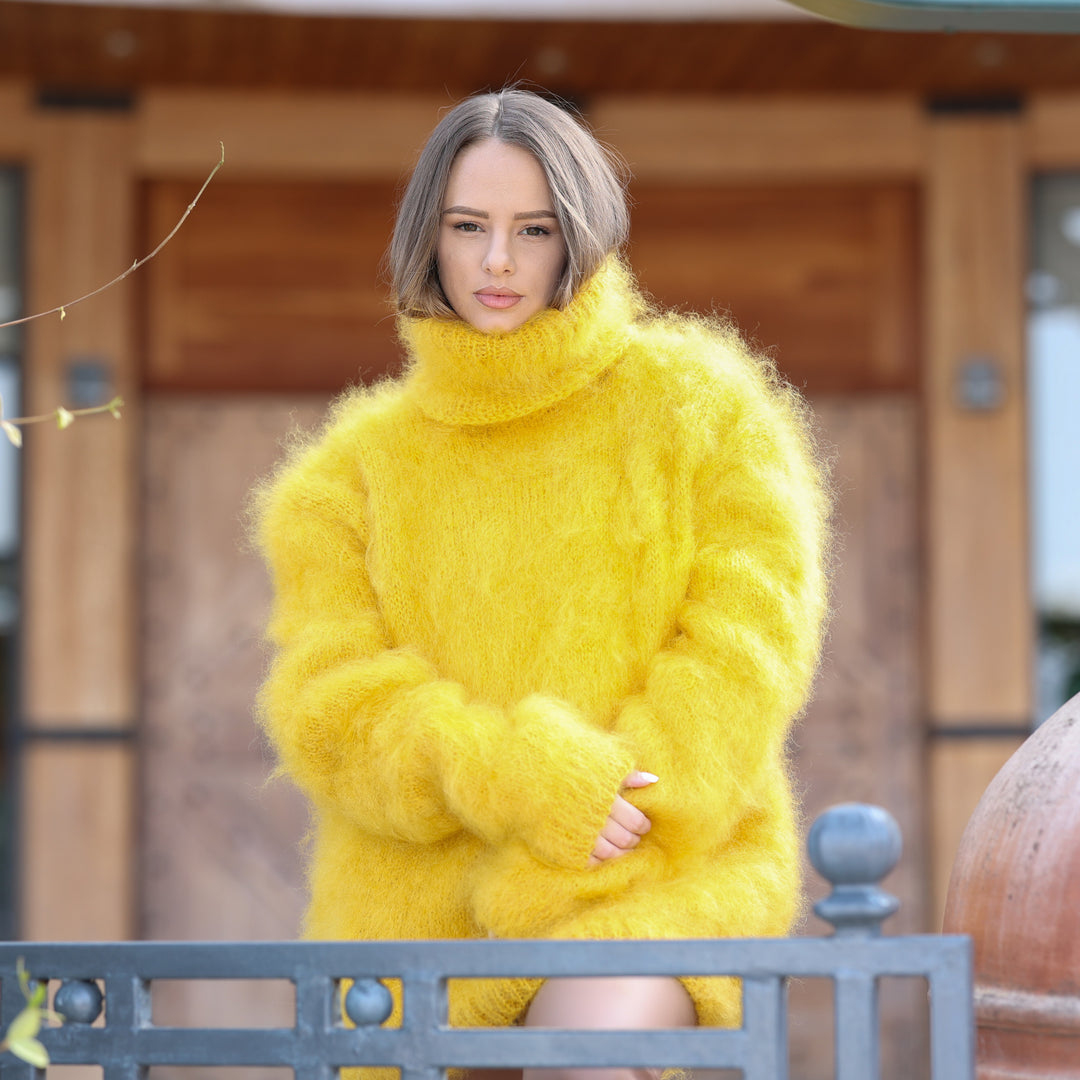 Bright yellow fluffy Kid Mohair oversized turtleneck sweater T2413 seated front view