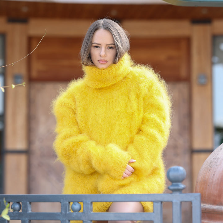 Bright yellow fluffy Kid Mohair oversized turtleneck sweater T2413 seated front view