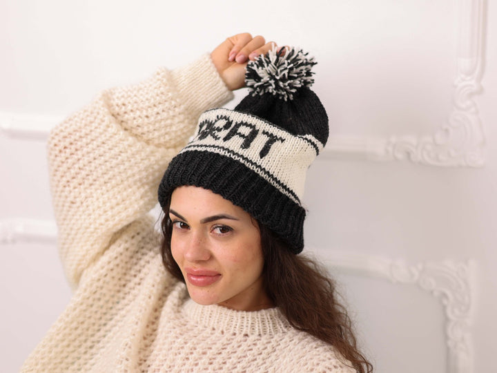 Black and cream personalized BRAT soft wool beanie on model
