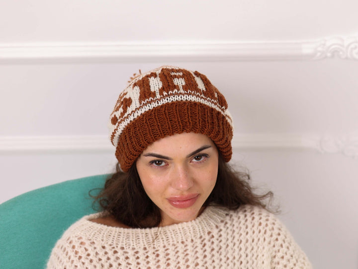 Angled view of brown cream soft wool personalized knit beanie