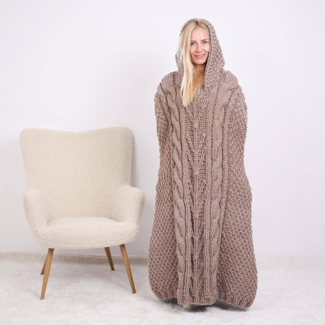 One available  Wool Poncho with cables and a hood T1896