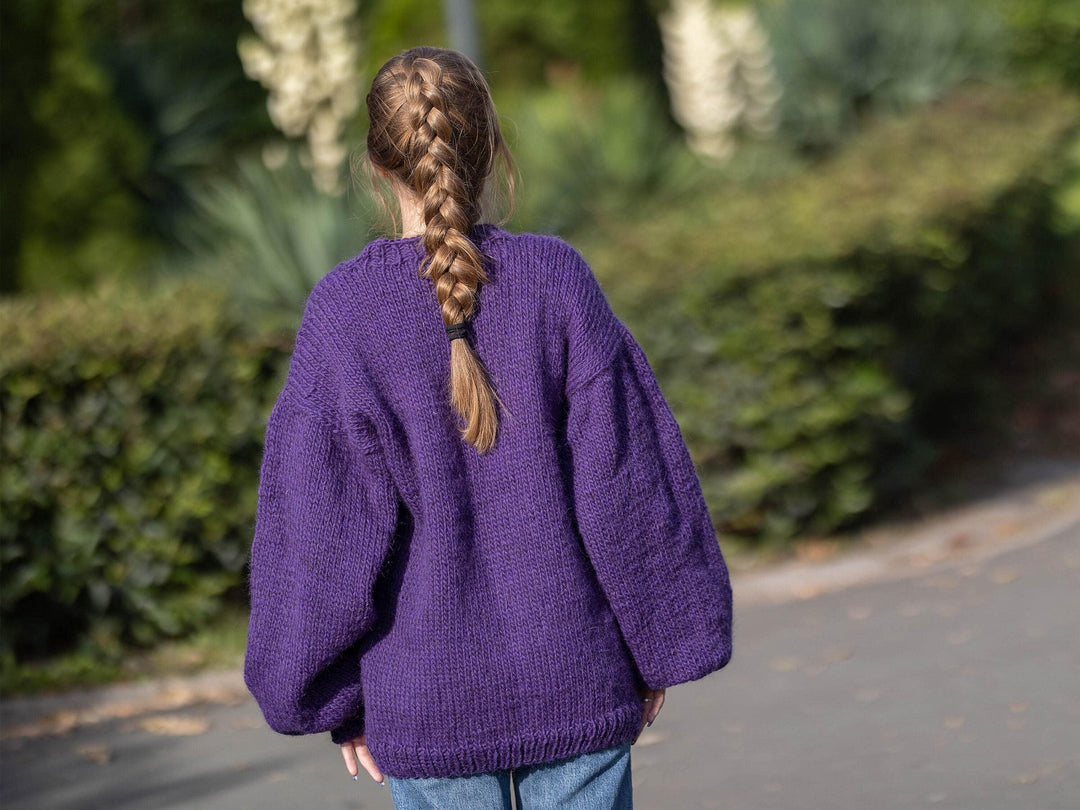 One available in size XL, 100 % Wool Sweater in purple colour T1269