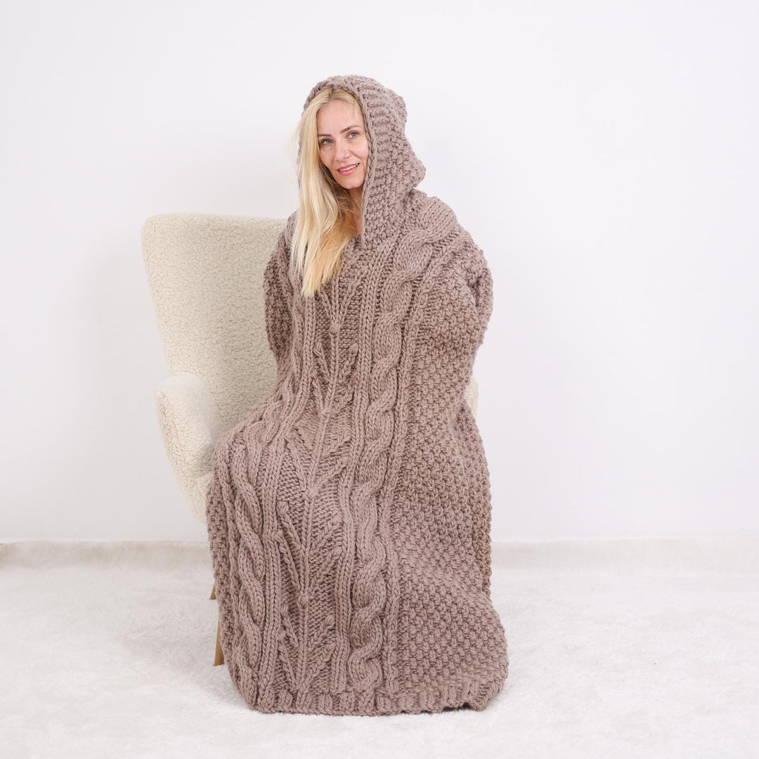 One available  Wool Poncho with cables and a hood T1896
