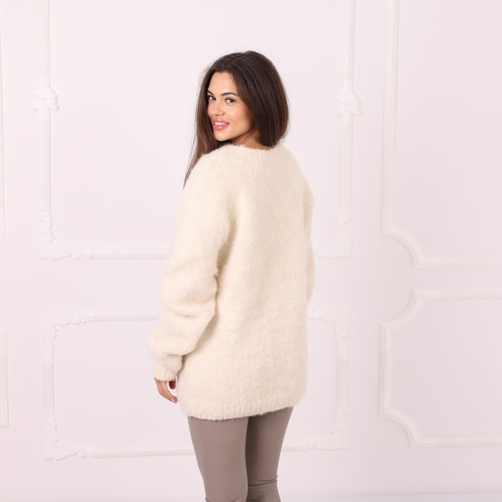 Back view of handmade cream alpaca sweater without turtleneck