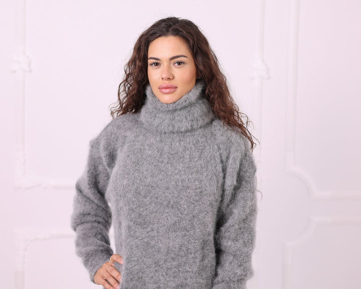 Gray fluffy kid mohair turtleneck sweater close up