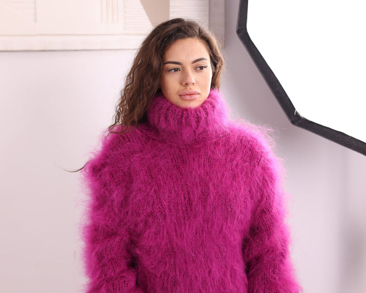 Pink mohair turtleneck sweater back view