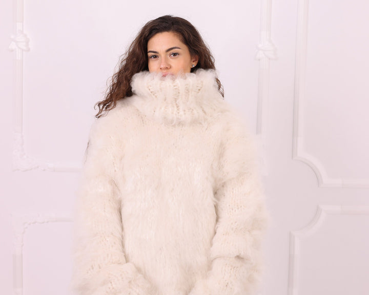 Cream fluffy long-haired alpaca turtleneck sweater front portrait