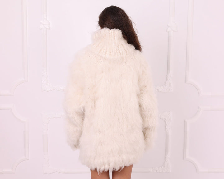 Cream fluffy long-haired alpaca turtleneck sweater back view