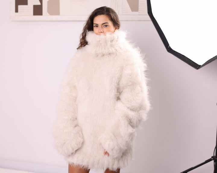 Cream long-haired alpaca oversized turtleneck sweater studio front view