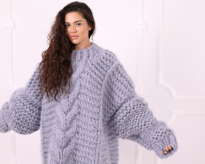 Gray chunky cable mohair sweater close up with balloon sleeves