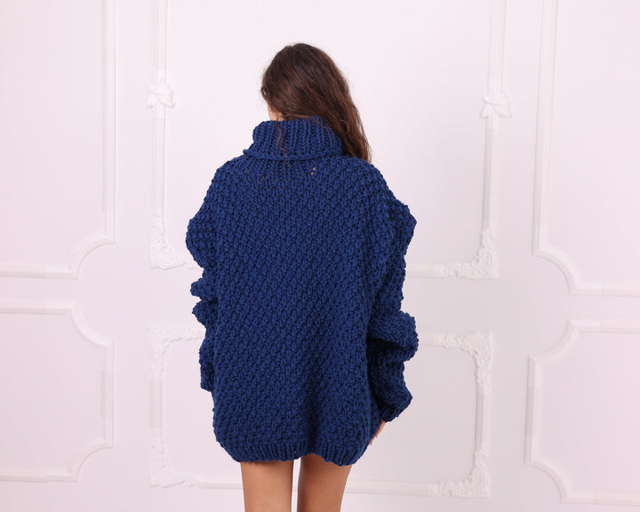Blue chunky wool oversized turtleneck sweater back view