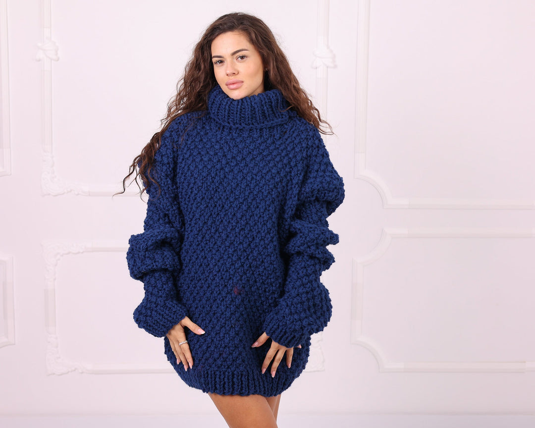 Blue oversized chunky wool turtleneck sweater front view