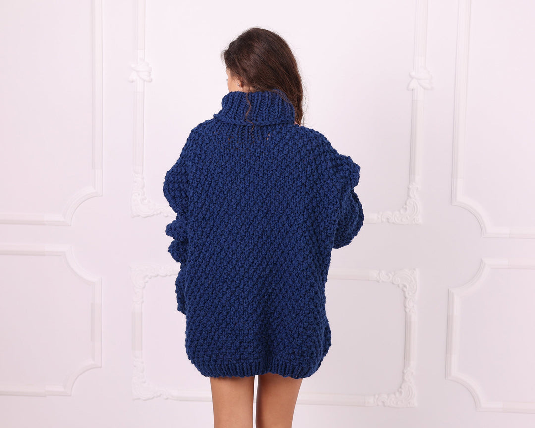 Blue oversized wool turtleneck sweater back view