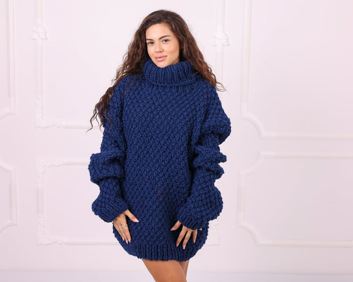 Blue chunky wool oversized turtleneck sweater front view