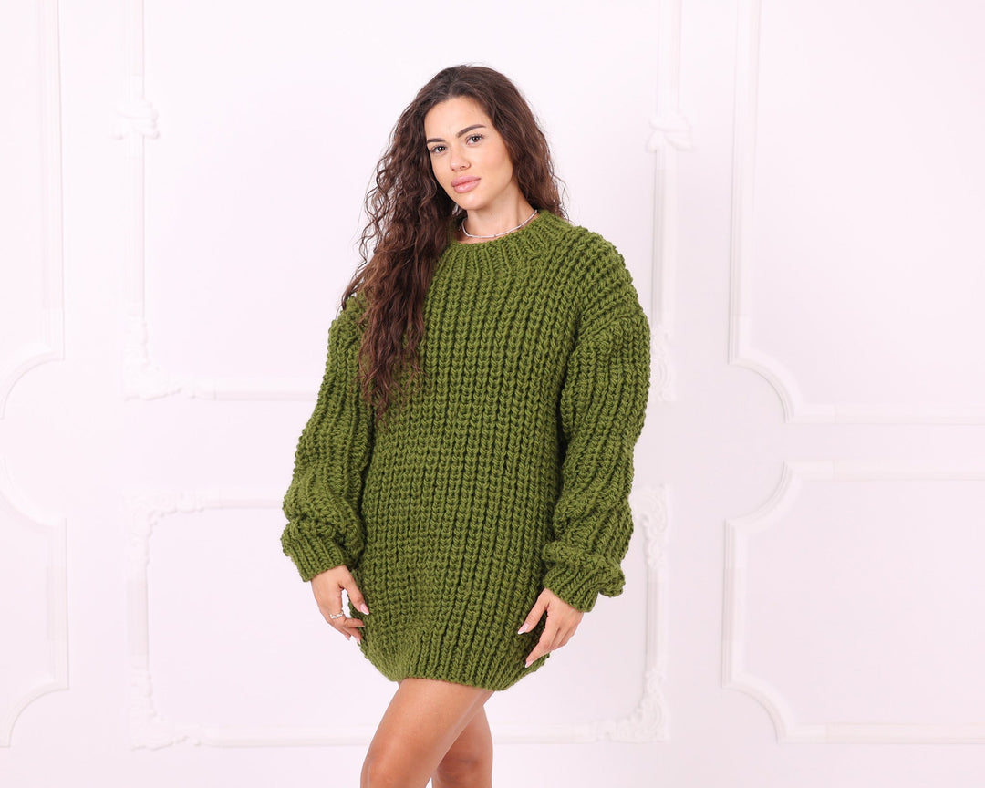 Green chunky wool sweater front three-quarter view
