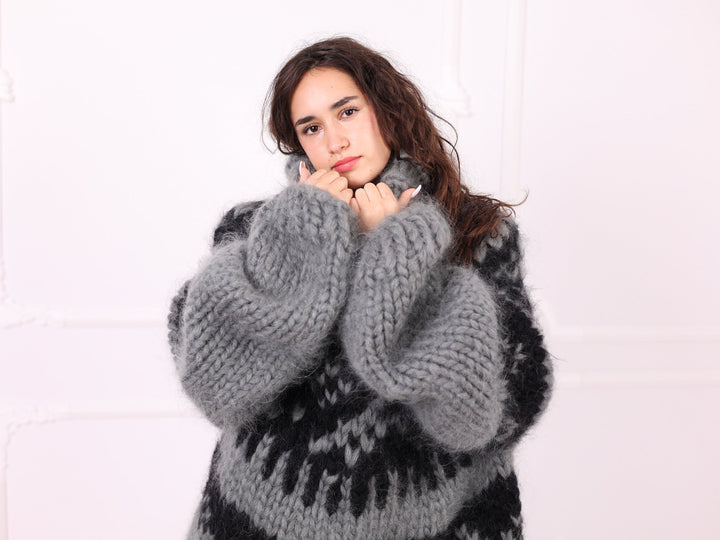 Gray chunky mohair turtleneck sweater oversized sleeve detail