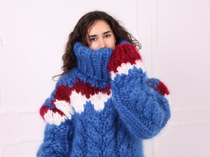 Blue mohair Nordic 50 cm turtleneck sweater close-up with red and ivory details