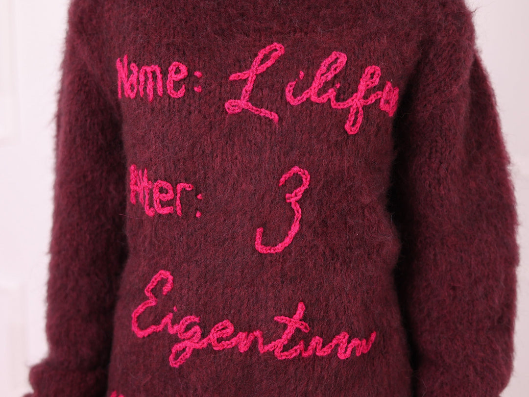 Burgundy alpaca bodysuit custom personalized text close-up