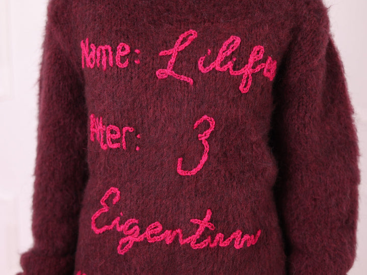 Burgundy alpaca bodysuit custom personalized text close-up