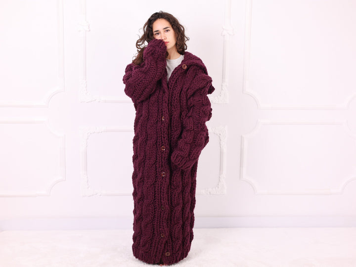 Burgundy wide sleeve cable knit cardigan front pose