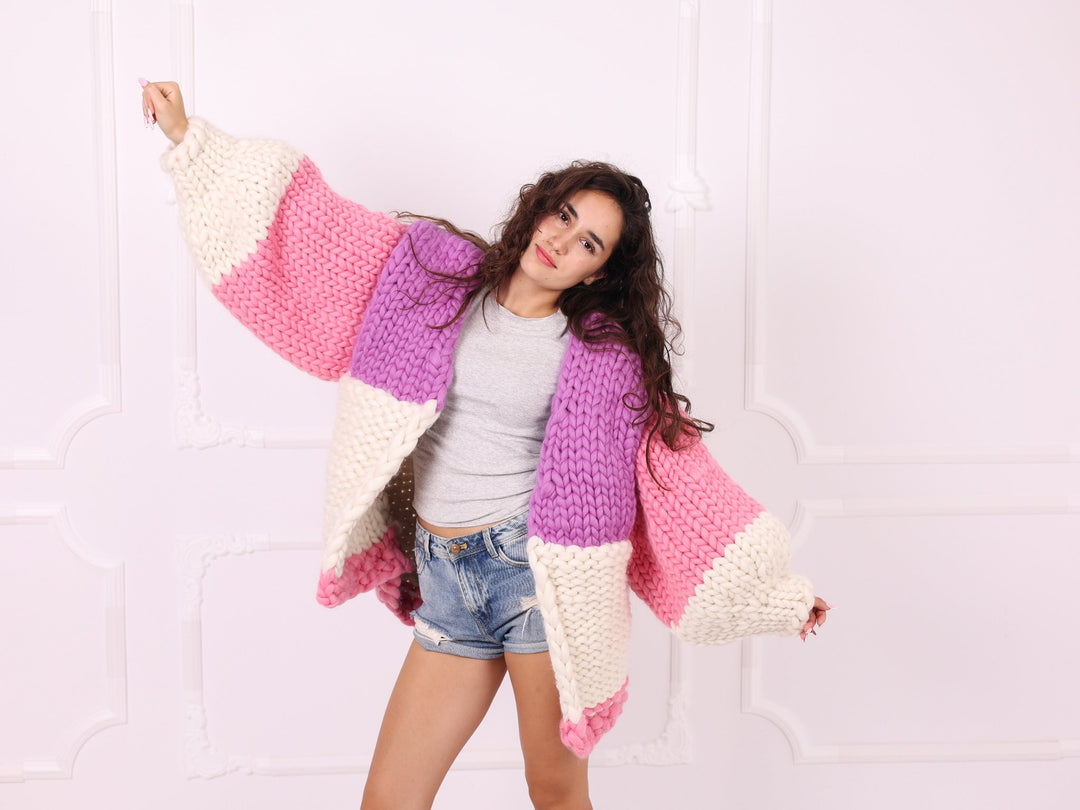 Pink lilac ivory chunky merino cardigan wide sleeve pose