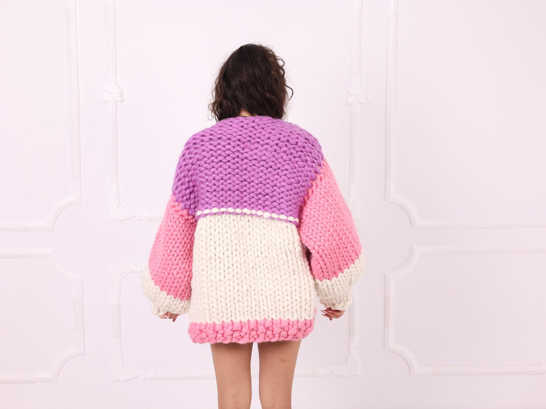 Pink lilac ivory merino roving cardigan back three-quarter view