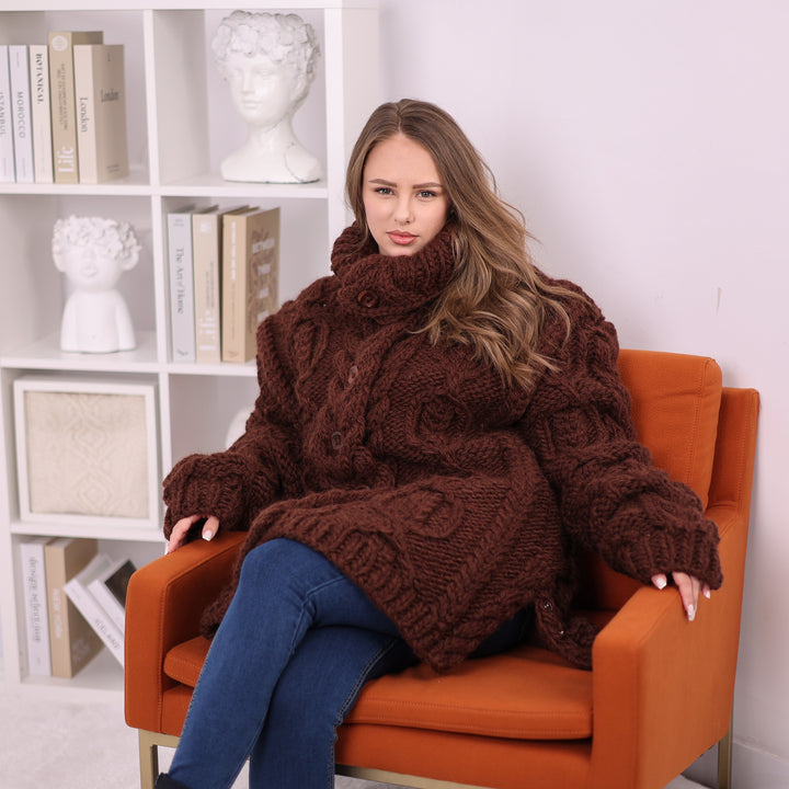 Brown chunky wool cable cardigan T2388 seated view