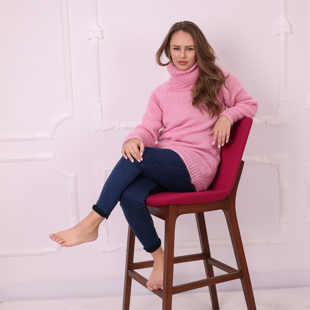 Pink mohair turtleneck sweater T2397 seated lifestyle view