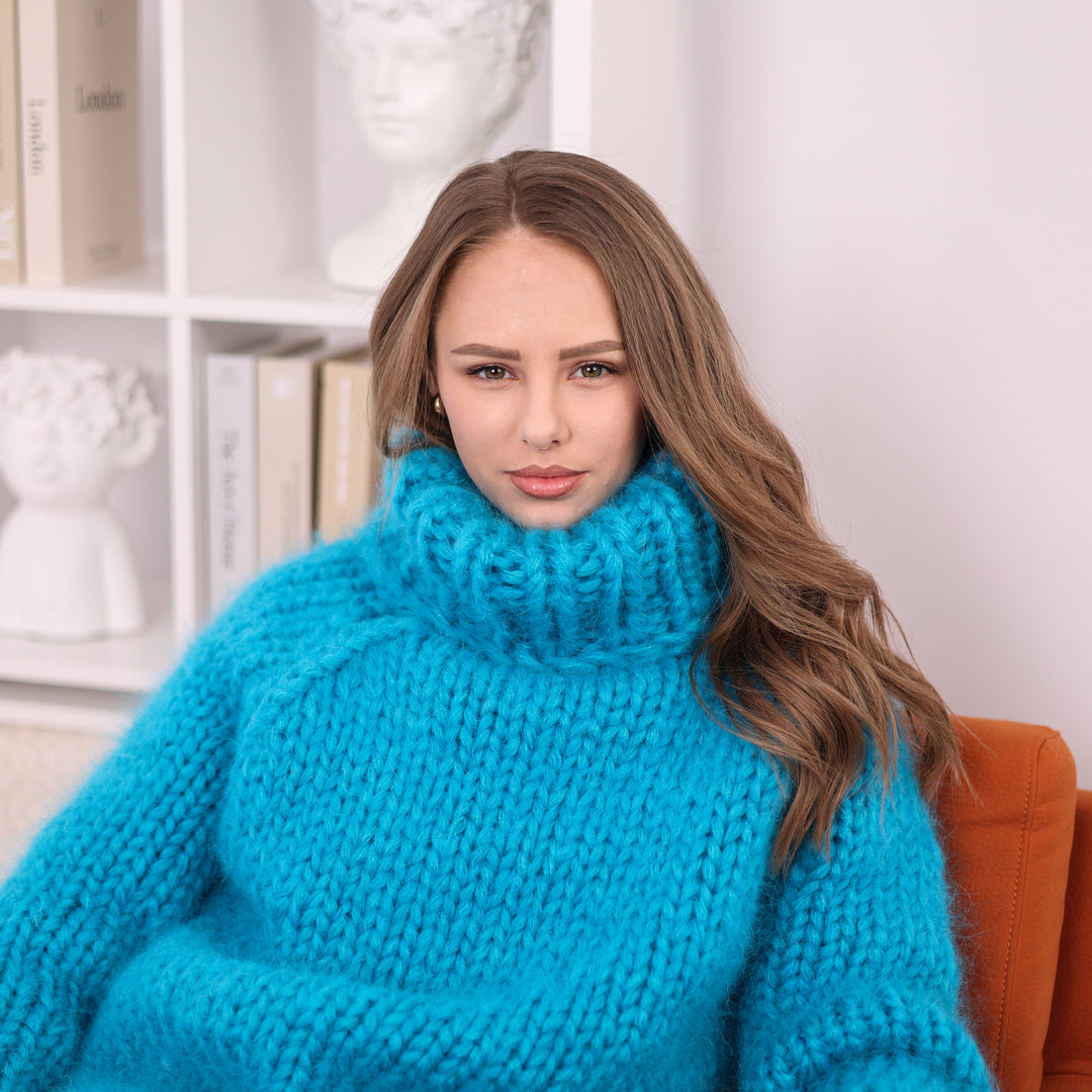 Blue mohair turtleneck sweater close-up with thick fuzzy knit texture T2398