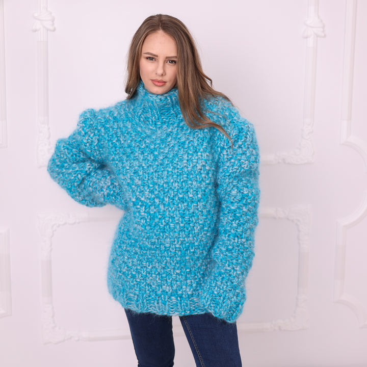 Blue melange chunky mohair sweater with high neck and textured knit standing view T2399