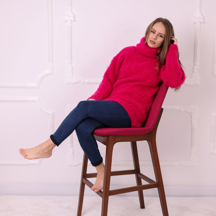 Hot pink fluffy kid mohair turtleneck sweater T2406 seated lifestyle view